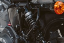 SLC side carrier left Harley Sportster models (04-).