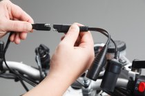 Cigarette lighter and DIN power socket for SAE Y-connection. Cable ca. 2x10 cm length. 12 V.